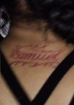 A picture of Samuel tat on Cardi B's back.
